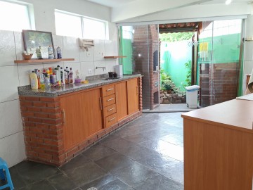 Cozinha da rea de servio com Churrasqueira